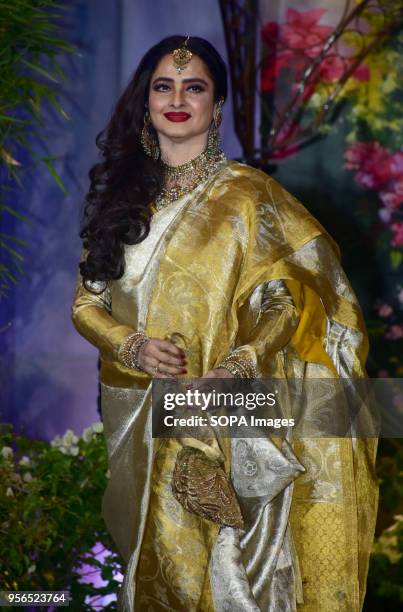 Indian film actress Rekha attend the wedding reception of actress Sonam Kapoor and Anand Ahuja at hotel Leela in Mumbai.