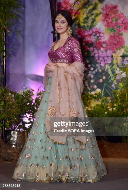 Indian film actress Divya Kumar Khosla attend the wedding reception of actress Sonam Kapoor and Anand Ahuja at hotel Leela in Mumbai.