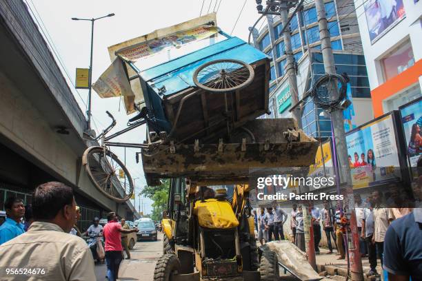 An eviction drive being carried out on footpath vendors by Guwahati Municipal Corporation in G.S Road, Guwahati.