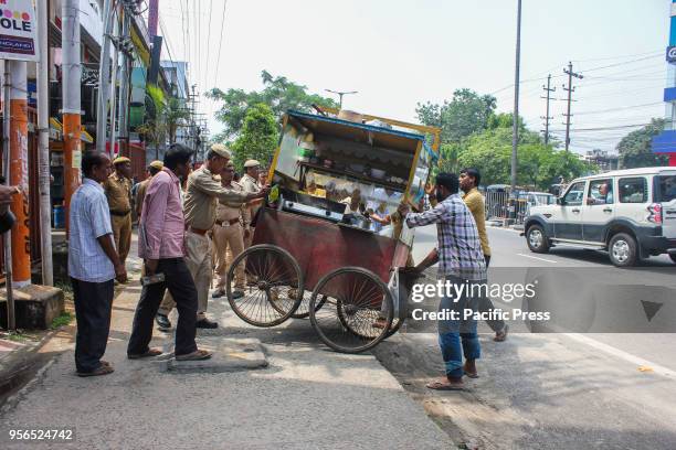 An eviction drive being carried out on footpath vendors by Guwahati Municipal Corporation in G.S Road, Guwahati.