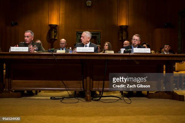 Chairman of the Joint Chiefs of Staff Gen. Joseph Dunford, left, testifies during a Senate Appropriations Subcommittee on Defense hearing to review...