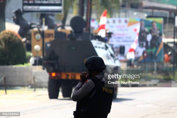 Police from the Mobile Brigade Corps were on guard in front of the Mobile Brigade Corps Command Headquarters in Depok, West Java, on Thursday, May 9...