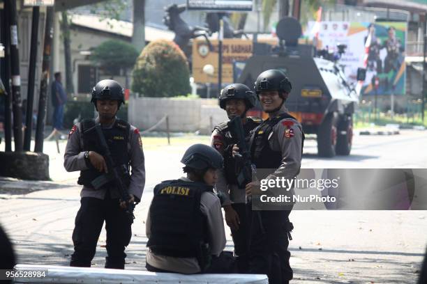 Police from the Mobile Brigade Corps were on guard in front of the Mobile Brigade Corps Command Headquarters in Depok, West Java, on Thursday, May 9...