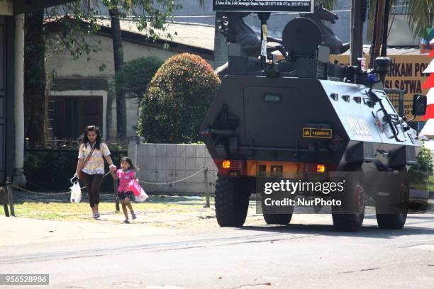 Police from the Mobile Brigade Corps were on guard in front of the Mobile Brigade Corps Command Headquarters in Depok, West Java, on Thursday, May 9...