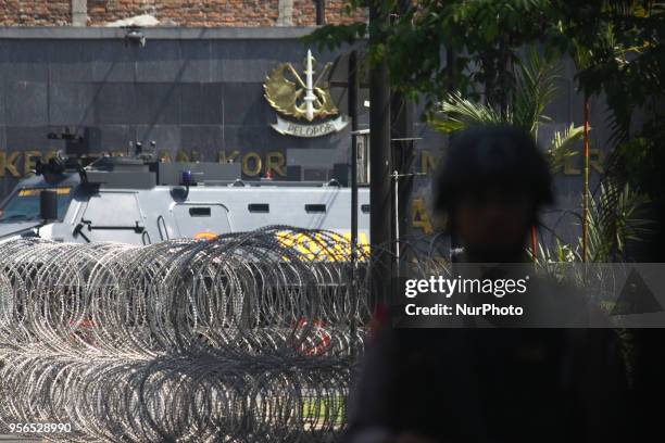 Police from the Mobile Brigade Corps were on guard in front of the Mobile Brigade Corps Command Headquarters in Depok, West Java, on Thursday, May 9...