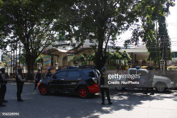 Police from the Mobile Brigade Corps were on guard in front of the Mobile Brigade Corps Command Headquarters in Depok, West Java, on Thursday, May 9...