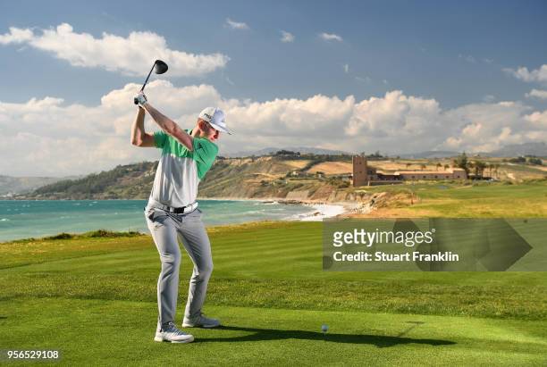 Connor Syme of Scotland plays a shot during practice prior to the start of The Rocco Forte Open at the Verdura golf resort on May 9, 2018 in Sciacca,...