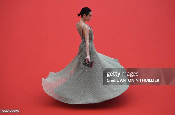 Japanese model Kiko Mizuhara poses as she arrives on May 9, 2018 for the screening of the film "Yomeddine" at the 71st edition of the Cannes Film...