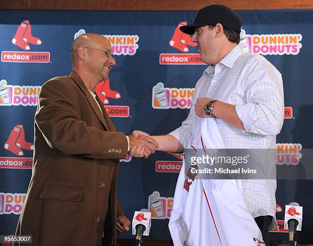 Boston Red Sox manager Terry Francona congratulates John Lackey during a press conference introducing Lackey as a member of the Red Sox at Fenway...
