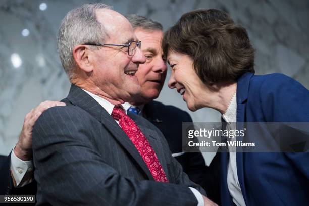 From left, Sens. James Risch, R-Idaho, Chairman Richard Burr, R-N.C., and Susan Collins, R-Maine, arrive for the Senate Intelligence Committee...