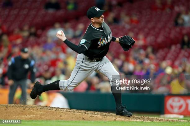 Brad Ziegler of the Miami Marlins throws a pitch during the game against the Cincinnati Reds at Great American Ball Park on May 5, 2018 in...