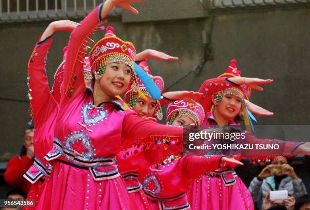 Chinese residents in Japan perform folk dance to celebrate Chinese Lunar New Year at Yokohama Chinatown in Yokohama, suburban Tokyo on January 29,...