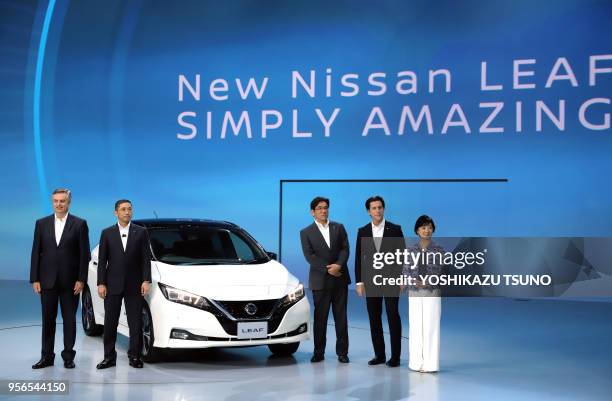 Japan's automobile giant Nissan Motor president Hiroto Saikawa and executives introduce the new electric vehicle "Leaf" in Chiba, suburban Tokyo on...