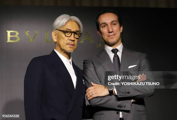 Le compositeur japonais Ryuichi Sakamoto auteur de la musique "TIME" pour la montre "Bvlgari Octo Finissimo Trilogy" et le PDG de Bvlgari Japan...