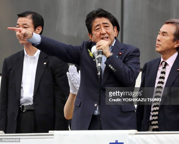 Japanese Prime Minister and ruling Liberal Democratic Party leader Shinzo Abe delivers a campain speech for his party candidate Aya Nakamura for the...