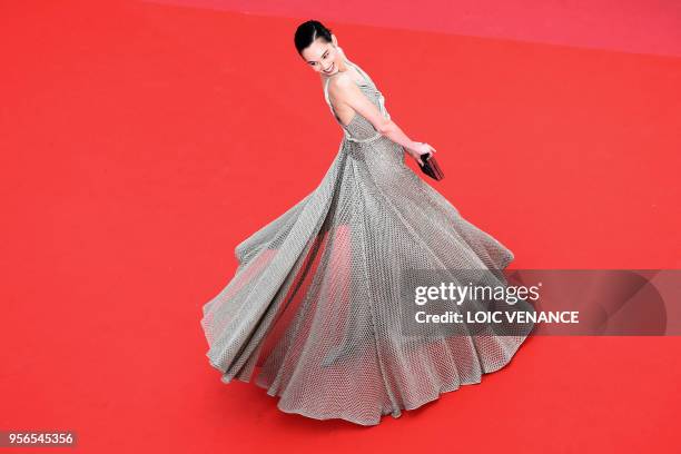 Japanese model Kiko Mizuhara poses as she arrives on May 9, 2018 for the screening of the film "Yomeddine" at the 71st edition of the Cannes Film...