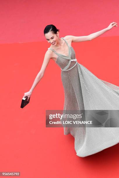 Japanese model Kiko Mizuhara poses as she arrives on May 9, 2018 for the screening of the film "Yomeddine" at the 71st edition of the Cannes Film...