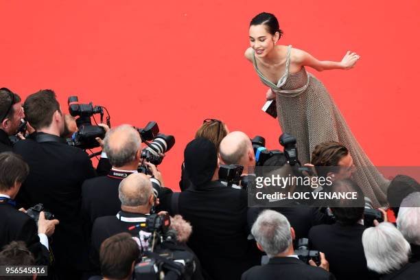 Japanese model Kiko Mizuhara poses for photographers as she arrives on May 9, 2018 for the screening of the film "Yomeddine" at the 71st edition of...
