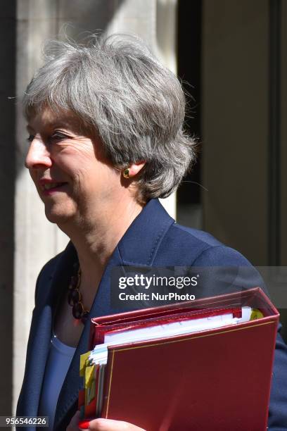 British Prime Minister leaves 10 Downing Street ahead to the House of Commons, to attend the weekly Prime Minister Questions and Answers session ,...