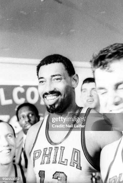 Playoffs: Philadelphia 76ers Wilt Chamberlain victorious in locker room after winning Game 5 and series vs Boston Celtics at Convention Hall....