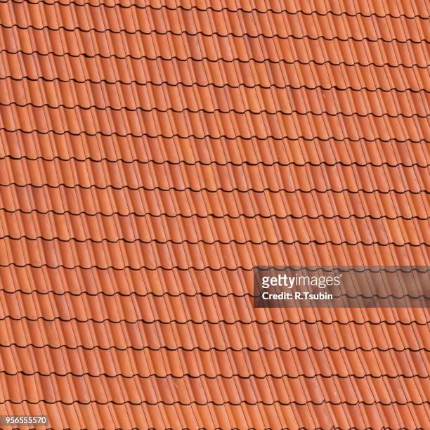 red roof tiles background details - roof tile stock-fotos und bilder