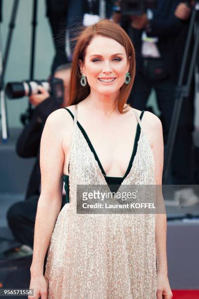 Julianne Moore walks the red carpet ahead of the 'Suburbicon' screening during the 74th Venice Film Festival at Sala Grande on September 2, 2017 in...
