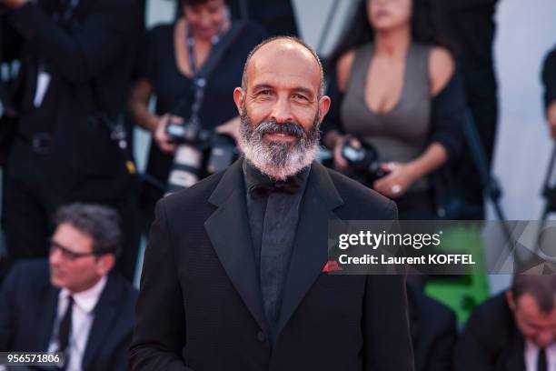 Jonis Bascir walks the red carpet ahead the Award Ceremony of the 74th Venice Film Festival at Sala Grande on September 9, 2017 in Venice, Italy.