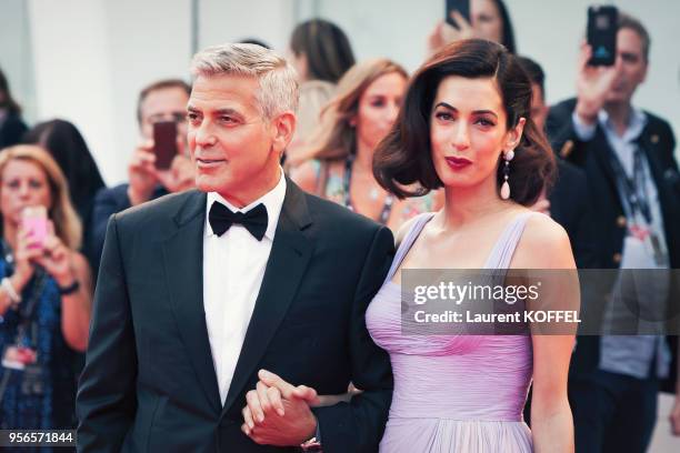 George Clooney and Amal Clooney walk the red carpet ahead of the 'Suburbicon' screening during the 74th Venice Film Festival at Sala Grande on...