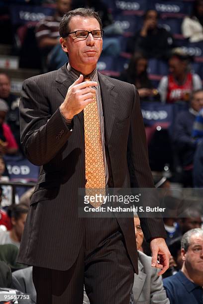 Head coach Kiki Vandeweghe of the New Jersey Nets look on during the game against the Golden State Warriors at the IZOD Center on December 9, 2009 in...