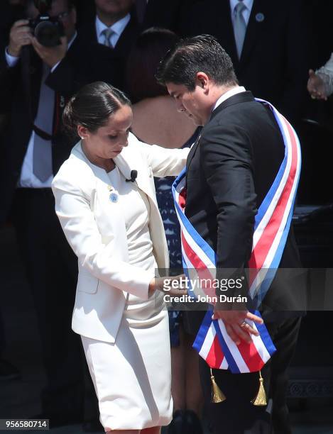 Carolina Hidalgo President of the Congress gives newly elected President of Costa Rica Carlos Alvarado the Presidential with the presidential sash at...
