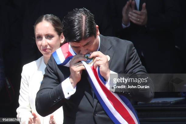 Carlos Alvarado elected President of Costa Rica kisses the Presidential Sash during his Inauguration Day at Plaza de la Democracia on May 08, 2018 in...