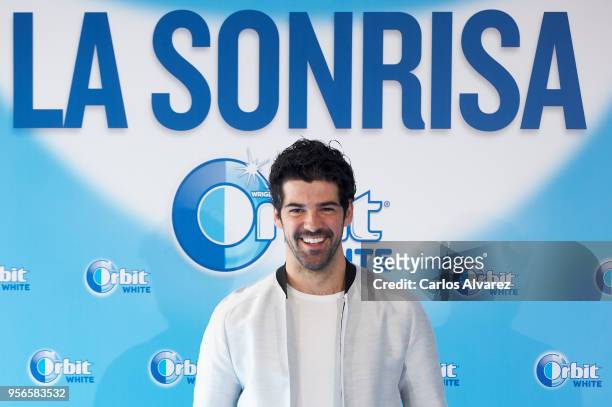 Miguel Angel Munoz attends 'Buscamos La Sonrisa Orbit White' competition at Club Allard restaurant on May 9, 2018 in Madrid, Spain.