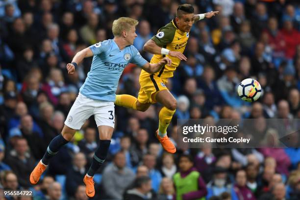 Anthony Knockaert of Brighton and Hove Albion wins a header over Alexander Zinchenko of Manchester City during the Premier League match between...