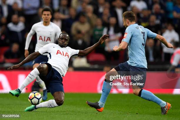 Moussa Sissoko of Tottenham Hotspur tackles Paul Dummett of Newcastle United during the Premier League match between Tottenham Hotspur and Newcastle...