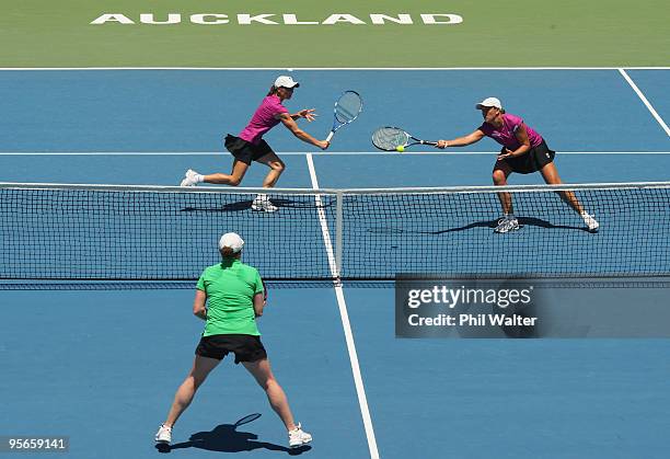 Liezel Huber of the USA and Cara Black of Zimbabwe (L during their doubles final against Natalie Grandin of South Africa and Laura Granville of the...