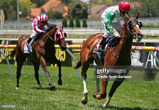 Jockey Mark Zahra riding Syndrome wins race 1 the Robert Taranto Handicap during the Summer Race Day meeting at Caulfield Racecourse on January 9,...