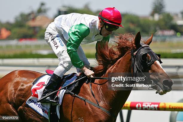 Jockey Mark Zahra riding Syndrome wins race 1 the Robert Taranto Handicap during the Summer Race Day meeting at Caulfield Racecourse on January 9,...