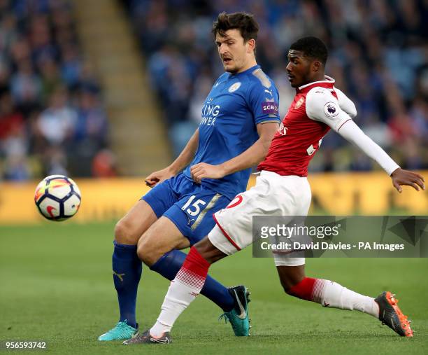 Leicester City's Harry Maguire and Arsenal's Ainsley Maitland-Niles battle for the ball during the Premier League match at the King Power Stadium,...
