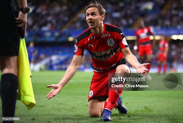 Chris Lowe of Huddersfield Town reacts during the Premier League match between Chelsea and Huddersfield Town at Stamford Bridge on May 9, 2018 in...