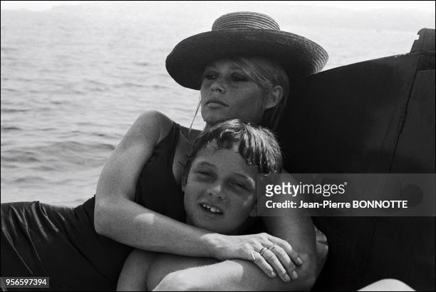 Brigitte Bardot with her son Nicolas Charrier at the Madrague in Saint-Tropez, France in August 1967. .