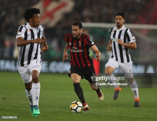 Hakan Calhanoglu of AC Milan in action during the TIM Cup Final between Juventus and AC Milan at Stadio Olimpico on May 9, 2018 in Rome, Italy.