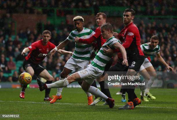 Jozo Simunovic of Celtic scores but it is judged offside during the Scottish Premier League between Celtic and Kilmarnock at Celtic Park on May 9,...