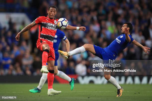 Rajiv van La Parra of Huddersfield Town in action with Pedro of Chelsea during the Premier League match between Chelsea and Huddersfield Town at...
