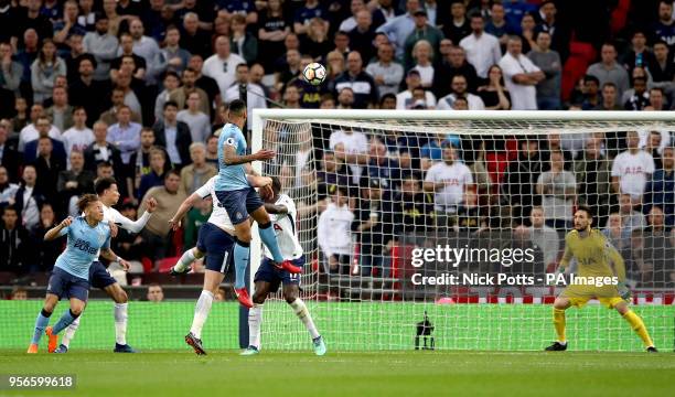 Newcastle United's Jamaal Lascelles heads the ball during the Premier League match at Wembley Stadium, London.