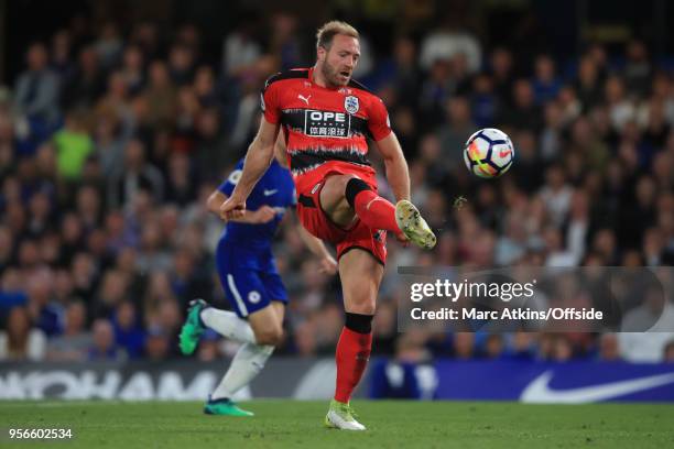 Laurent Depoitre of Huddersfield Town scores the opening goal during the Premier League match between Chelsea and Huddersfield Town at Stamford...