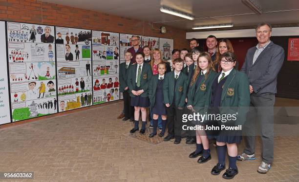 Pictured are local school children with artist David Andrews, Margaret Aspinall chairman of the Hillsborough family support group and Stephen Done,...