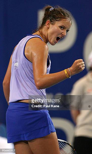 Laura Robson of Great Britain celebrates wining a point in her match against Maria Jose Martinez Sanchez of Spain in the final match between Great...