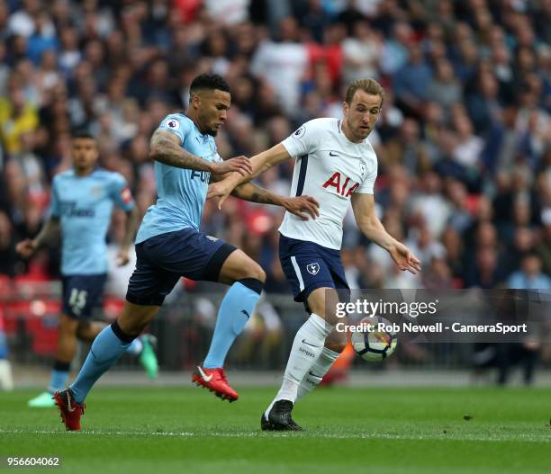Tottenham Hotspur's Harry Kane and Newcastle United's Jamaal Lascelles during the Premier League match between Tottenham Hotspur and Newcastle United...