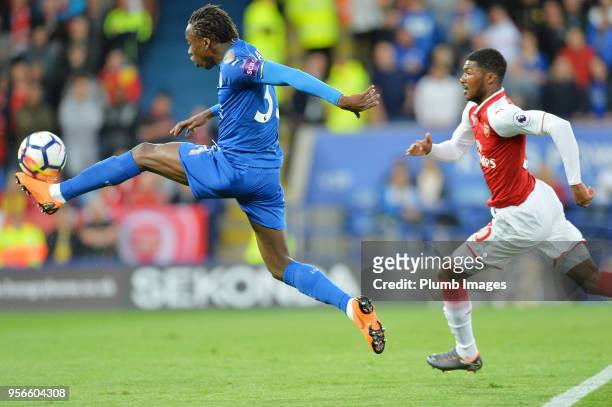Fousseni Diabate of Leicester City in action with Ainsley Maitland-Niles of Arsenal during the Premier League match between Leicester City and...