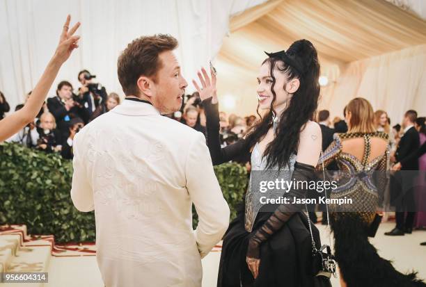 Elon Musk and Grimes attend the Heavenly Bodies: Fashion & The Catholic Imagination Costume Institute Gala at The Metropolitan Museum of Art on May...